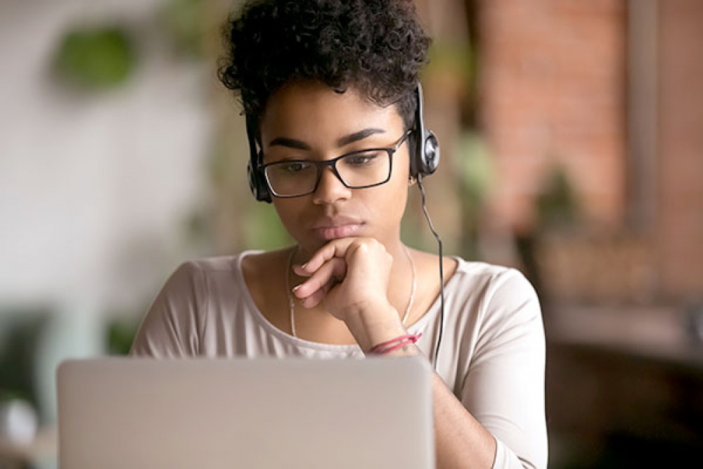 Focused woman watching videos